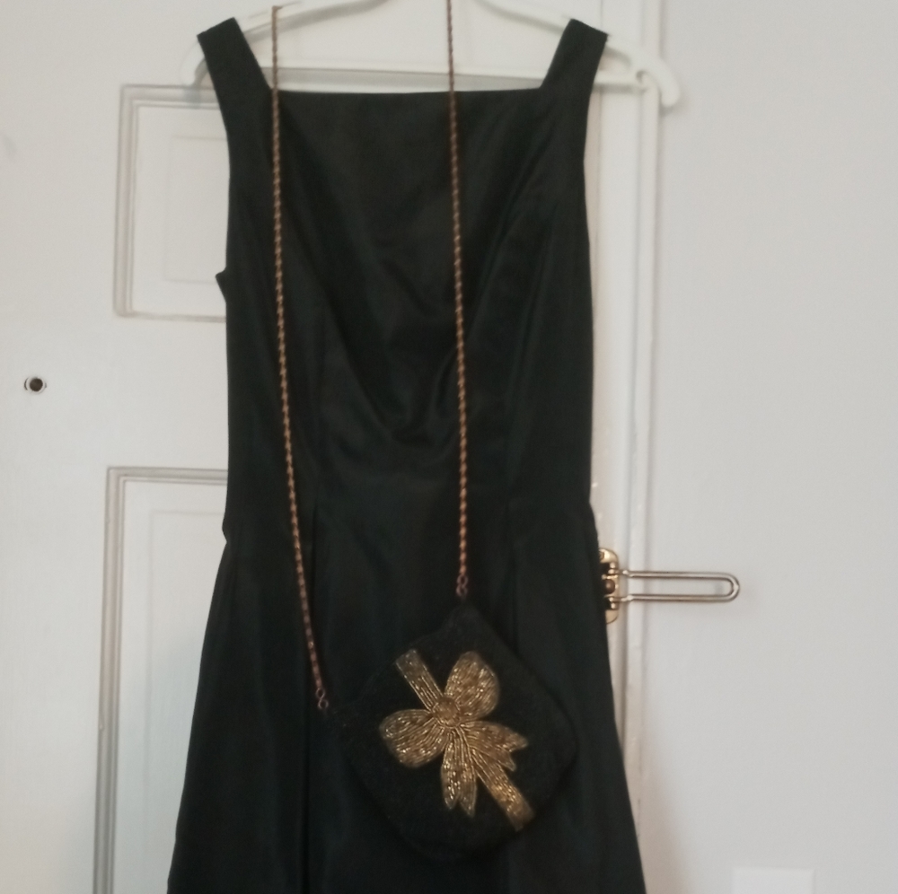 Black ball gown dress with bow detail in the back